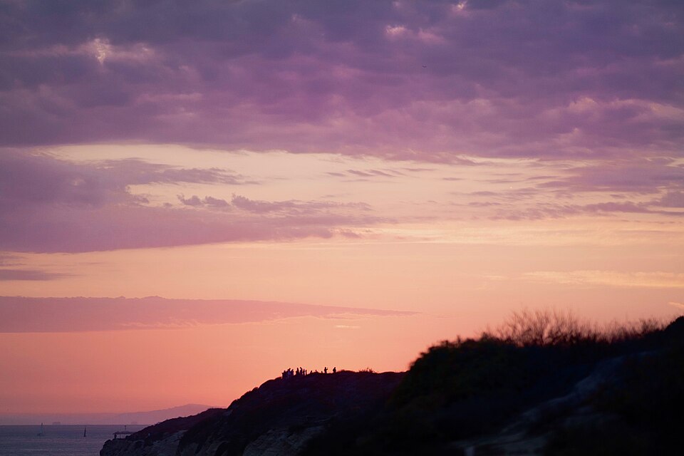 Sunset near ocean with pink and purple sky.jpg